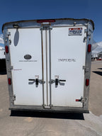Rear double doors of 2013 Royal T 3 horse trailer with Royal T logo and Imperial model branding.