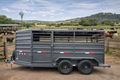 2021 ex-bison 20' x 10' livestock trailer displayed at Frontier Trailers & Roping Supply.