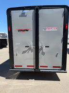 rear double doors of Logan Coach Crossfire horse trailer with Crossfire and Frontier Trailers logos, locking latches, reflective safety tape, and durable aluminum construction for secure livestock transport.