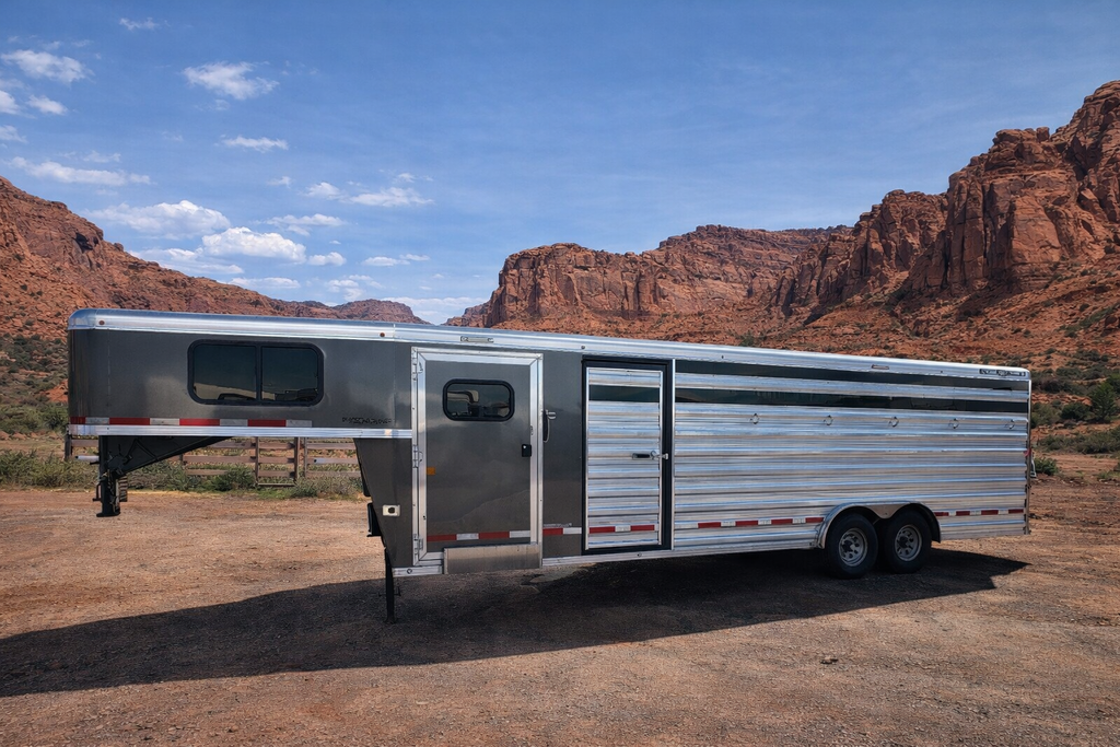 2021 Featherlite 20' livestock trailer displayed at Frontier Trailers & Roping Supply, showcasing its sturdy design.

