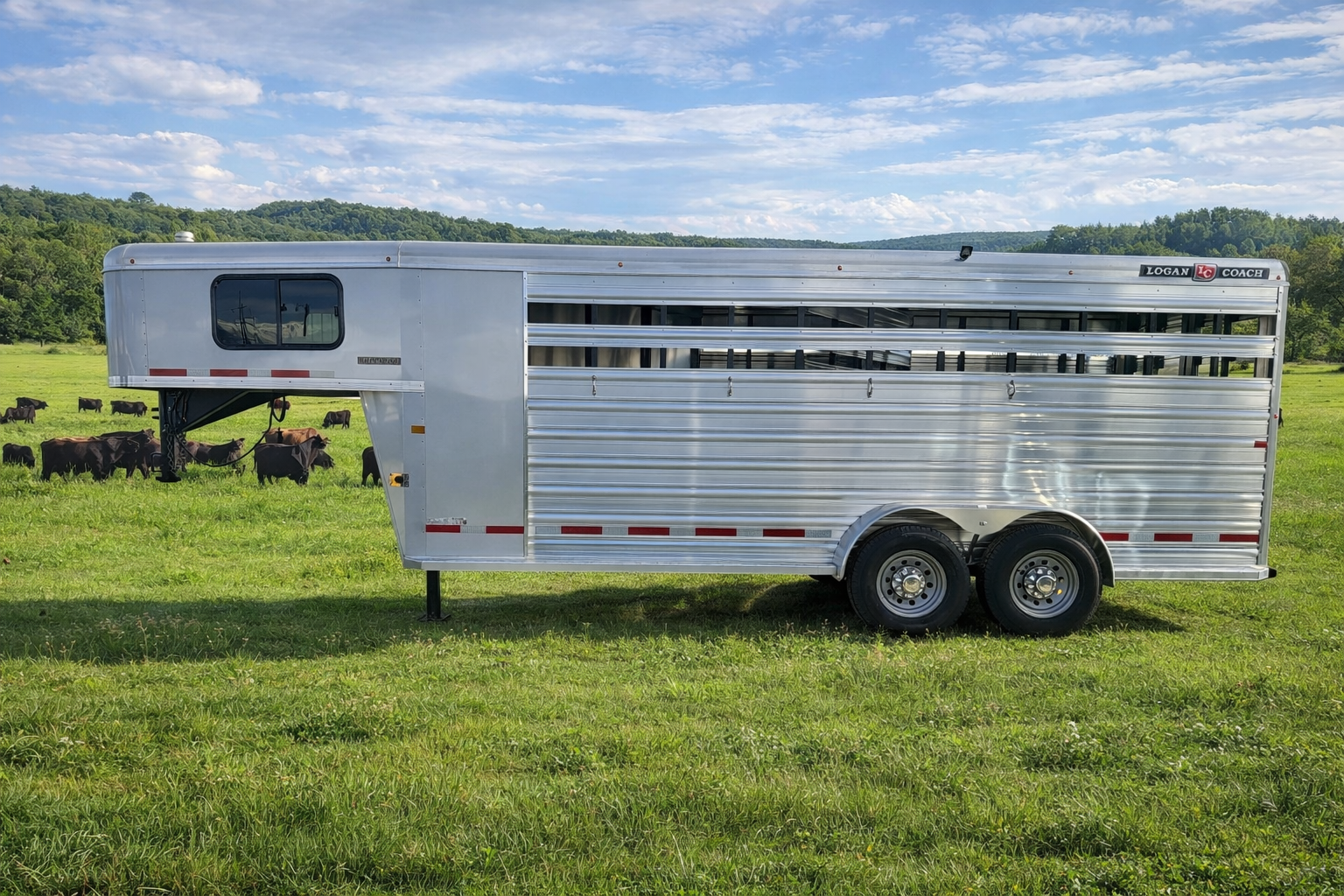 A 2020 Exiss 7HX2H livestock trailer at Frontier Trailers & Roping Supply, highlighting its spacious and robust construction.