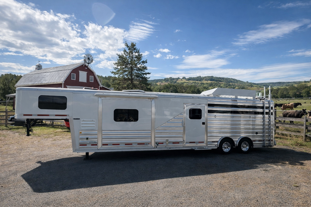 2021 Exiss 710HQ four-horse trailer displayed at Frontier Trailers & Roping Supply, showcasing its sleek design and features.