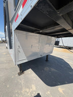 diamond plate aluminum storage compartments under gooseneck with dual locking doors, heavy duty support legs, electrical hookup cable, and reinforced trailer frame for hauling equipment.